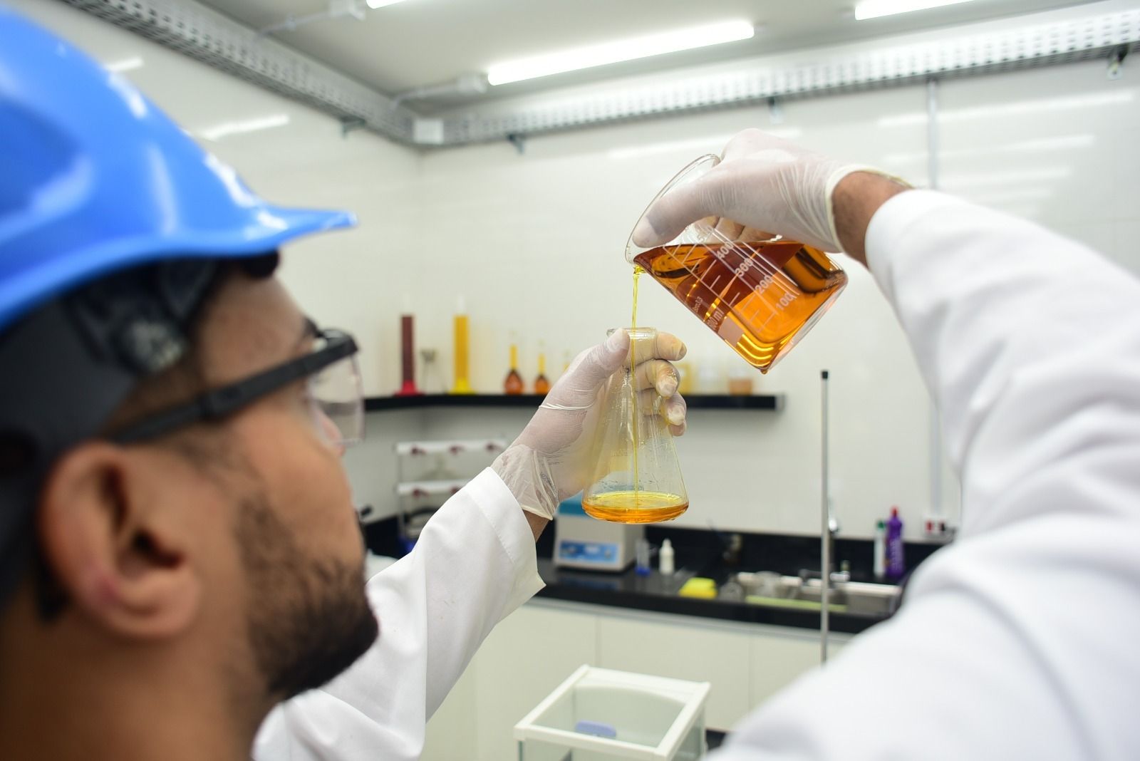 Uniformed worker at the Grupo BBF laboratory in Ji Paraná